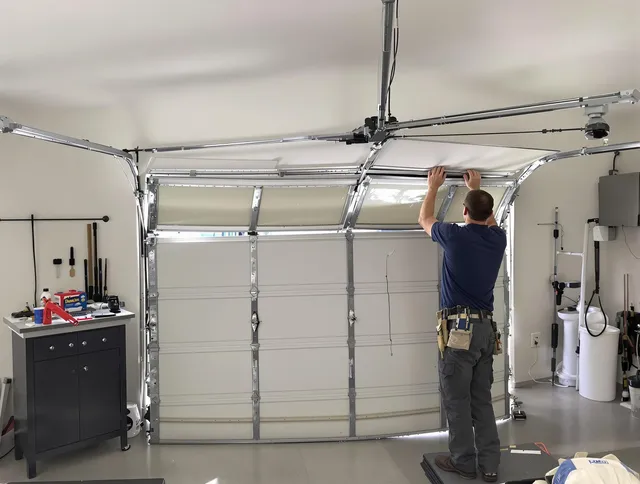 Covina Garage Door Repair specialist performing precise section replacement on Covina garage door