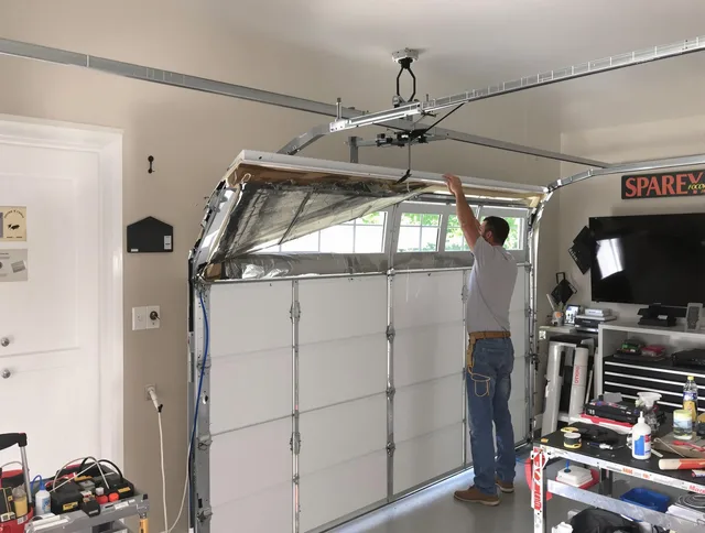 Garage door section replacement by Covina Garage Door Repair in Covina