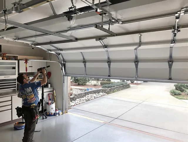 Garage door track repair service by Covina Garage Door Repair in Covina